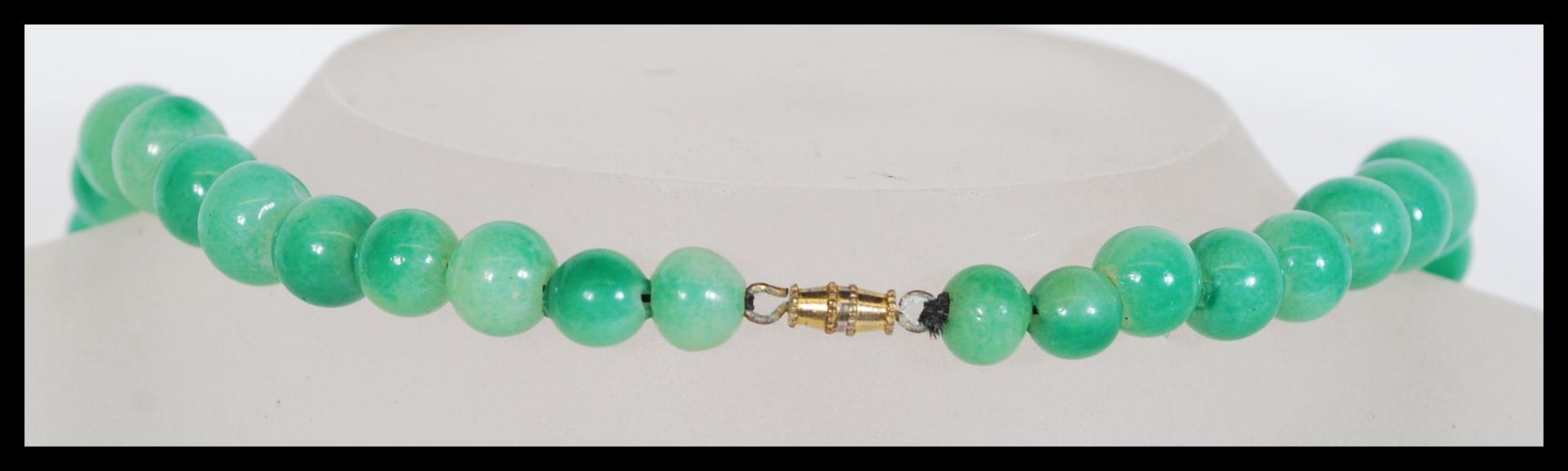 A vintage Chinese believed green jade or Peking gl - Image 4 of 4