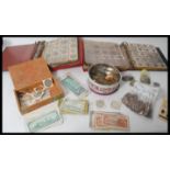 Three albums of assorted coins to include a good assortment of British Half Crowns dating from