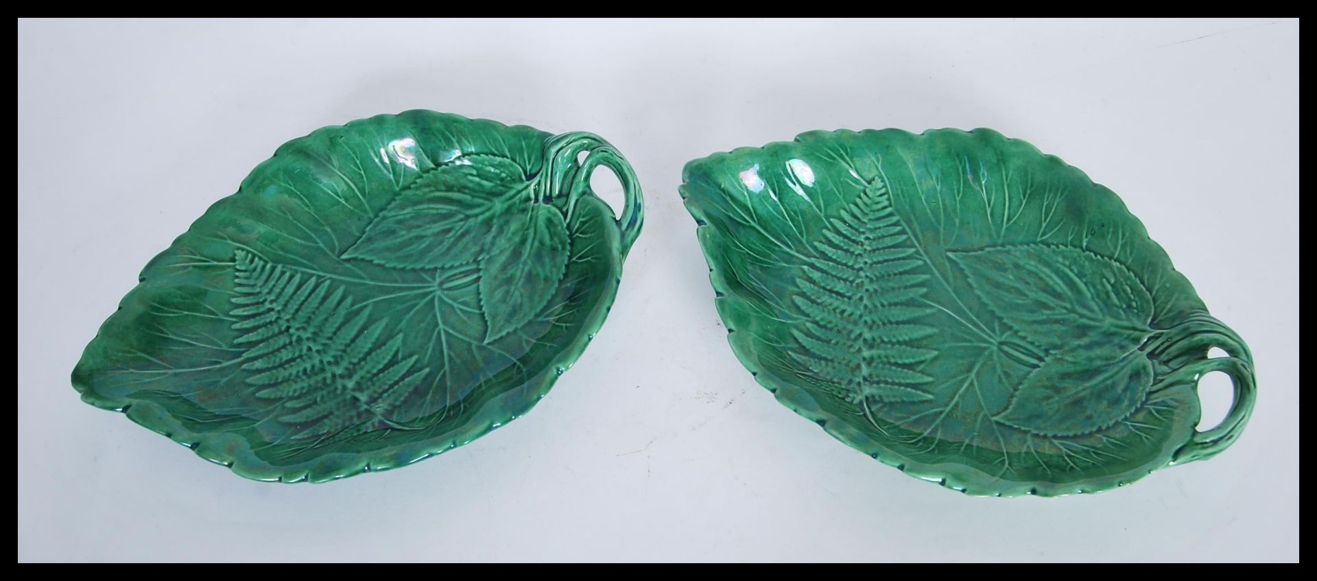 A pair of 19th Century Minton Majolica serving plates in the form of two leaves having raised