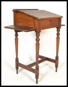 An early 20th Century oak scholars school desk with notation for the Durham Educational Society>