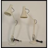 Two vintage retro Herbert Terry 20th Century anglepoise table desk lamps  raised on circular bases