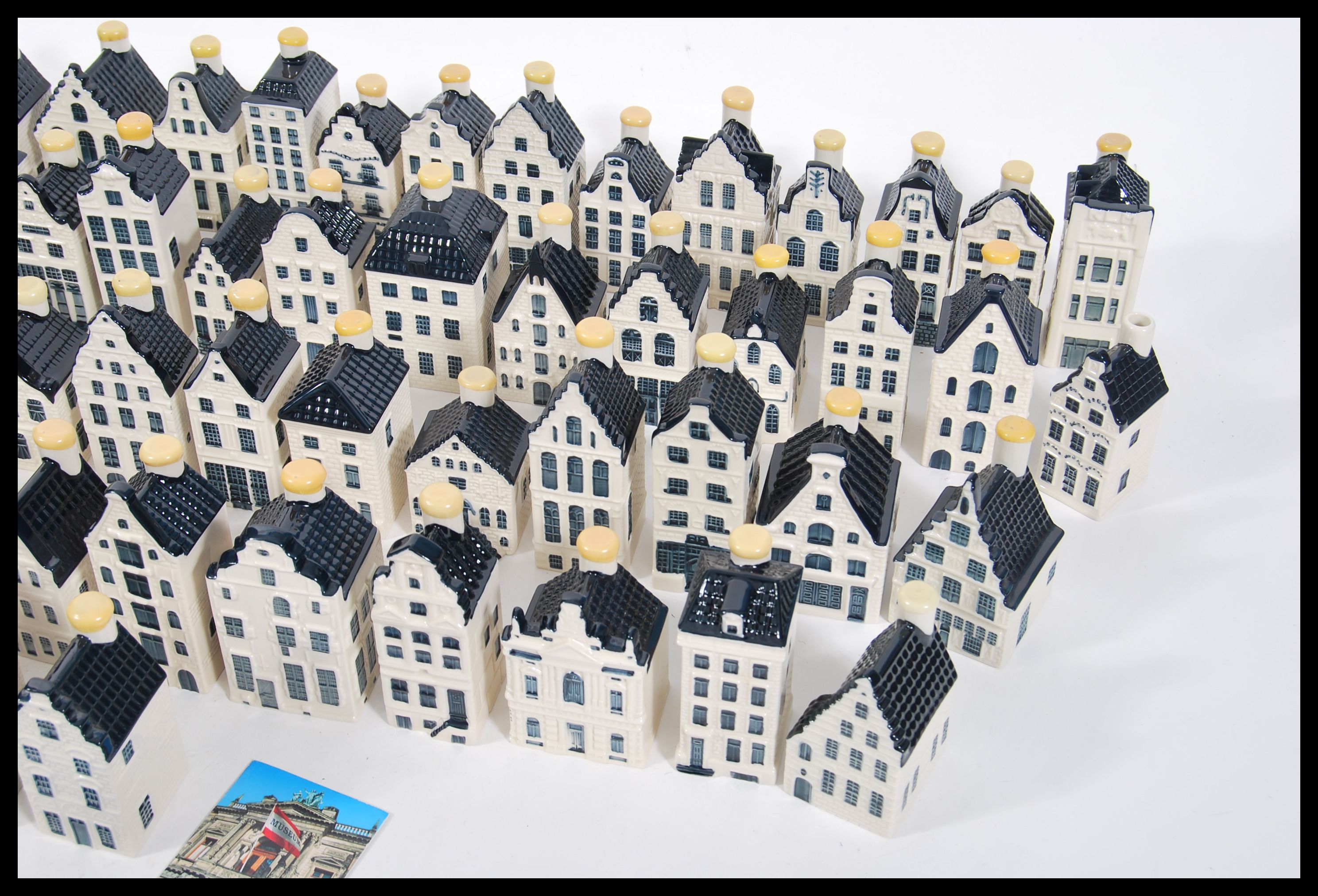 A collection of seventy nine collectable KLM ceramic blue and white Delft 'Bols' houses, all wax - Image 4 of 7