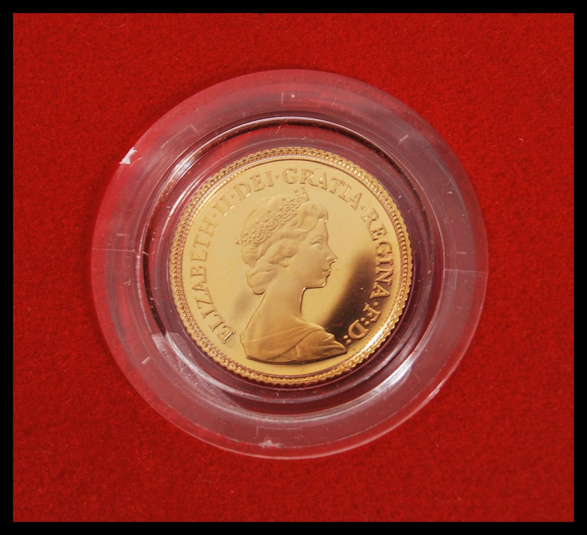 A 22ct gold 1980 half sovereign having the Queen head facing right and George and the Dragon to