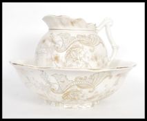 A 19th Century Victorian rare wash bowl and jug set by Moore Leason & Co. The bowl and jug of