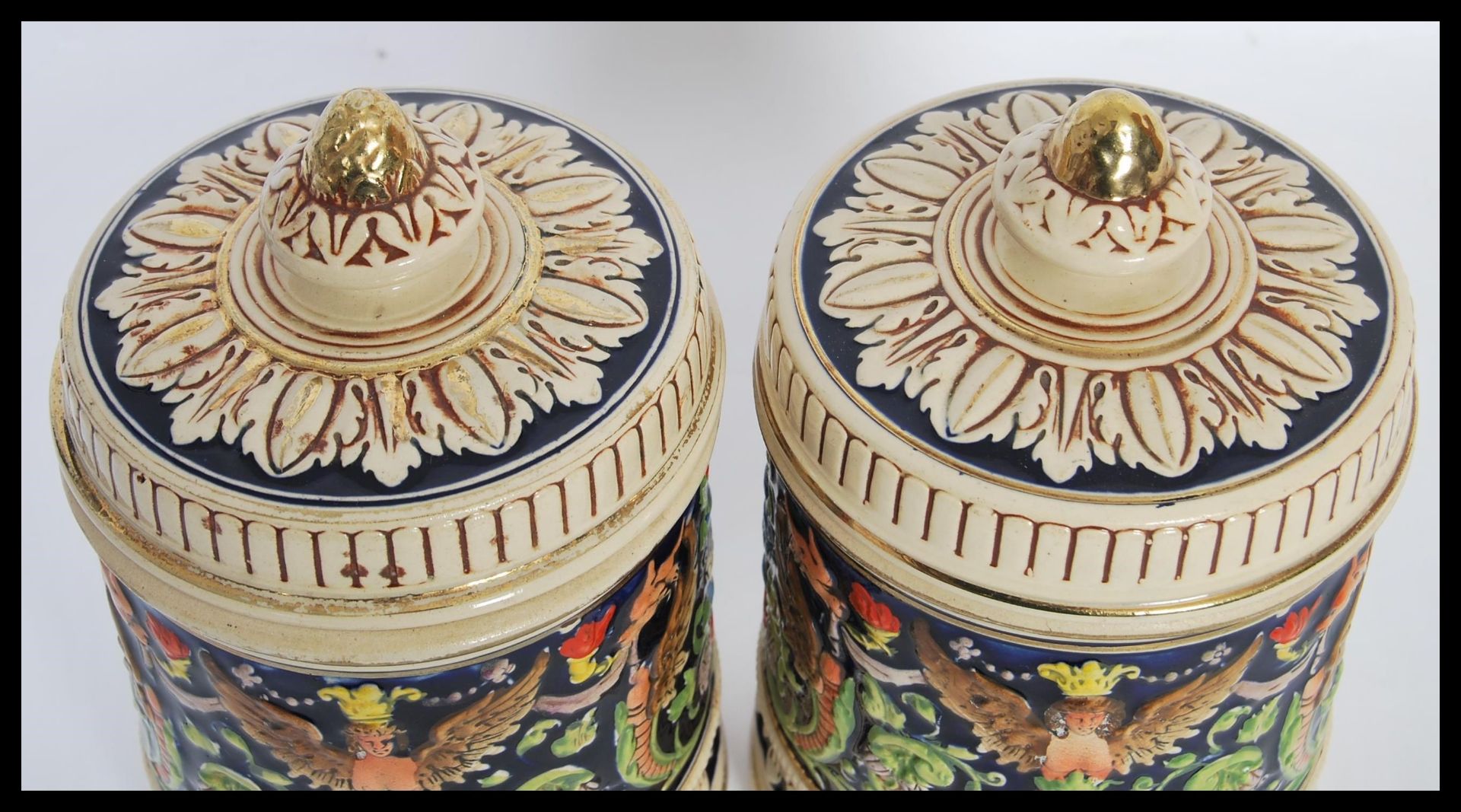 A pair of 20th Century German ceramic biscuit barrels / tobacco jar pots having hand painted - Image 2 of 6