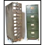 Two vintage 20th Century industrial metal filing cabinets,to include an eleven drawer cabinet by