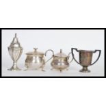 A group of silver to include a hallmarked silver lidded table salt / mustard pot condiment, silver