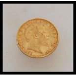 A 1904 Edward VII full gold sovereign stamped for the Melbourne mint. Weight 8.0g.