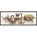 A group of Walker and Hall silver plate to include a matching teapot and hot water jug, epergne on