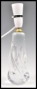 A vintage retro 20th Century French glass crystal table lamp of shaped form having gilt collar