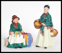 Two Royal Doulton ceramic figurines to include Silks and Ribbons HN2017 of a seated lady with