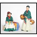 Two Royal Doulton ceramic figurines to include Silks and Ribbons HN2017 of a seated lady with