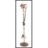 A vintage retro 20th Century floor standing twin spot lamp raised on circular base with copper