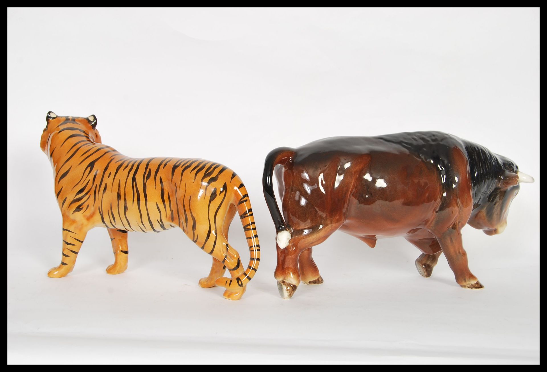 A large vintage 20th Century Beswick ceramic figurine in the form of a tiger along with a SylvaC - Image 2 of 3