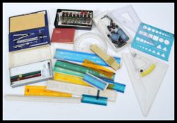 A collection of vintage engineers drawing tools to include a boxed Rotring variant pen with spare