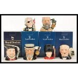 A collection of Royal Doulton character jugs in the form of historical figures to include Henry VIII