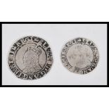 Two Elizabethan 16th Century hammered silver coins to include a 1590 sixpence having the head facing