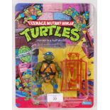 VINTAGE TNMT TEENAGE MUTANT NINJA TURTLES CARDED ACTION FIGURE