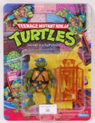 VINTAGE TNMT TEENAGE MUTANT NINJA TURTLES CARDED ACTION FIGURE