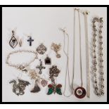 A group of sterling silver necklaces and pendants
