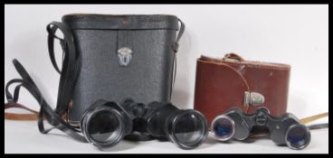 Two pairs of vintage 20th Century binoculars to in