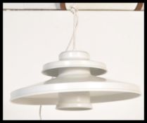 A vintage retro light fixture in the manner of Pou