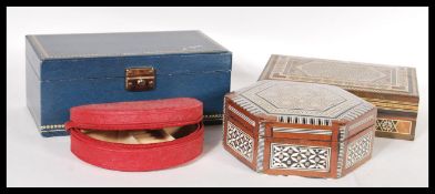 A collection of four 20th Century jewellery boxes