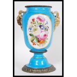 A 19th Century French ceramic urn vase in the mann