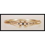 A vintage 9ct gold bangle bracelet of circular for