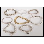 A good group of sterling silver bracelets to inclu