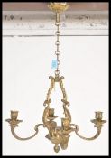 A 20th Century bronze candelabra having four candl