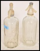 Two vintage retro 20th Century faceted glass soda