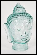 A vintage retro 20th Century glass Buddha head fea