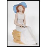 A 20th Ceramic figurine in the manner of Lladro by