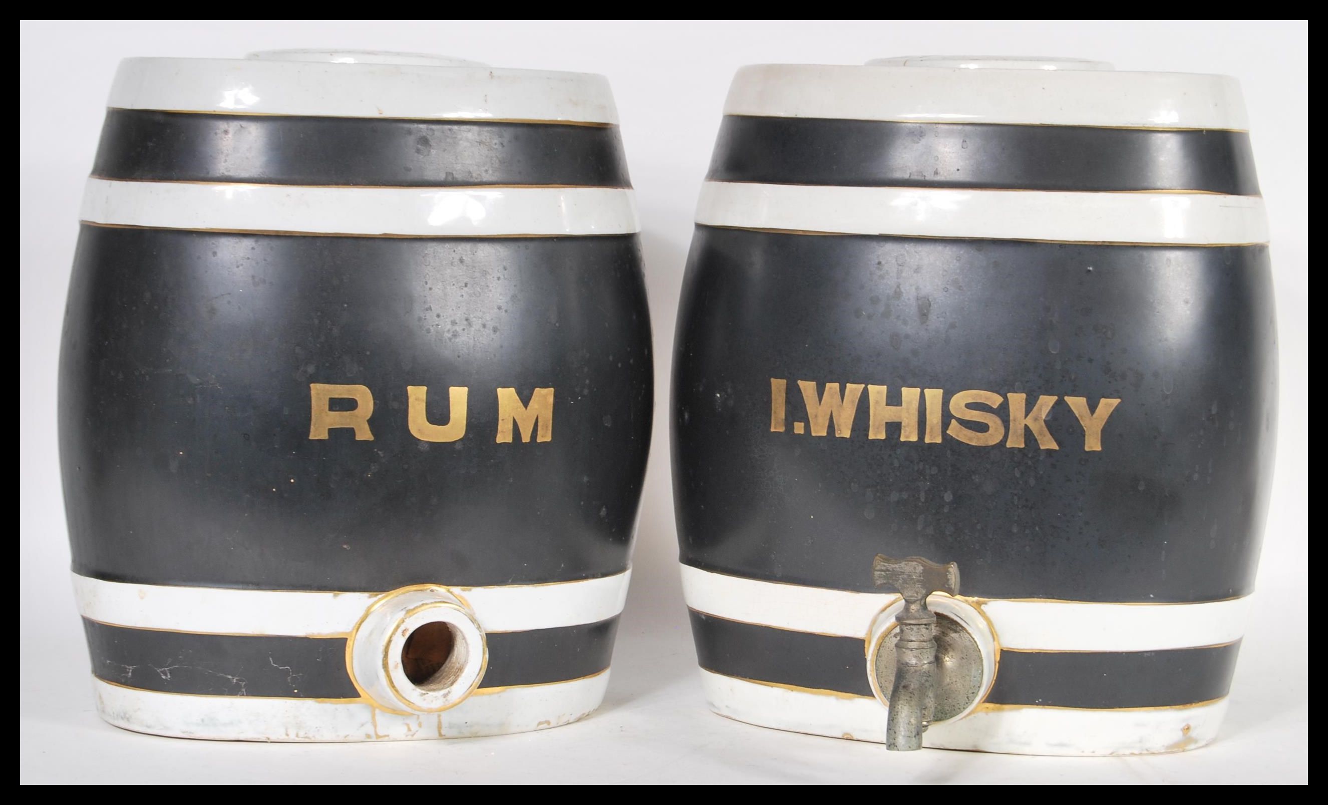 A pair of Staffordshire pottery spirit barrels of