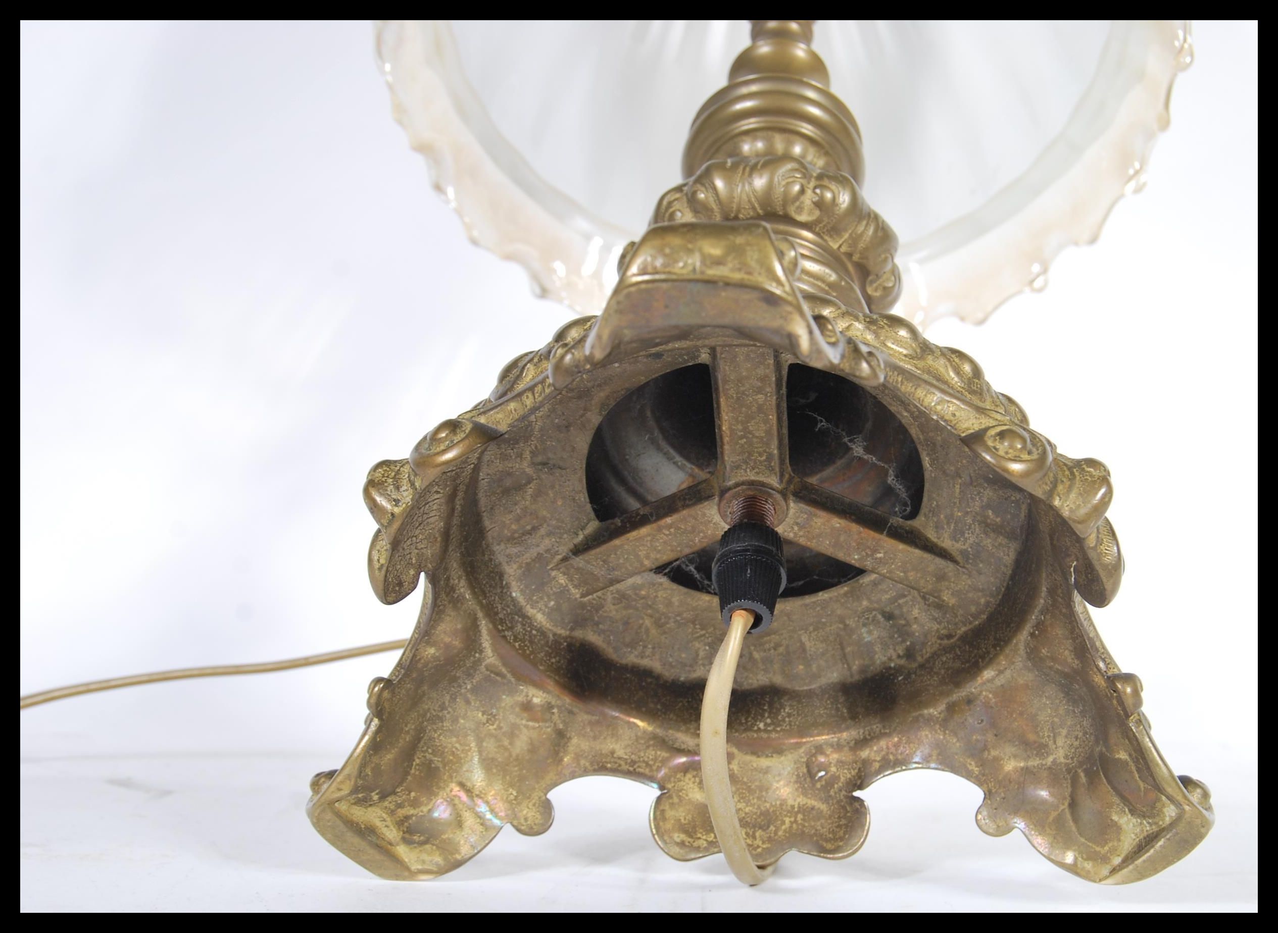 An early 20th Century heavy brass table lamp of sc