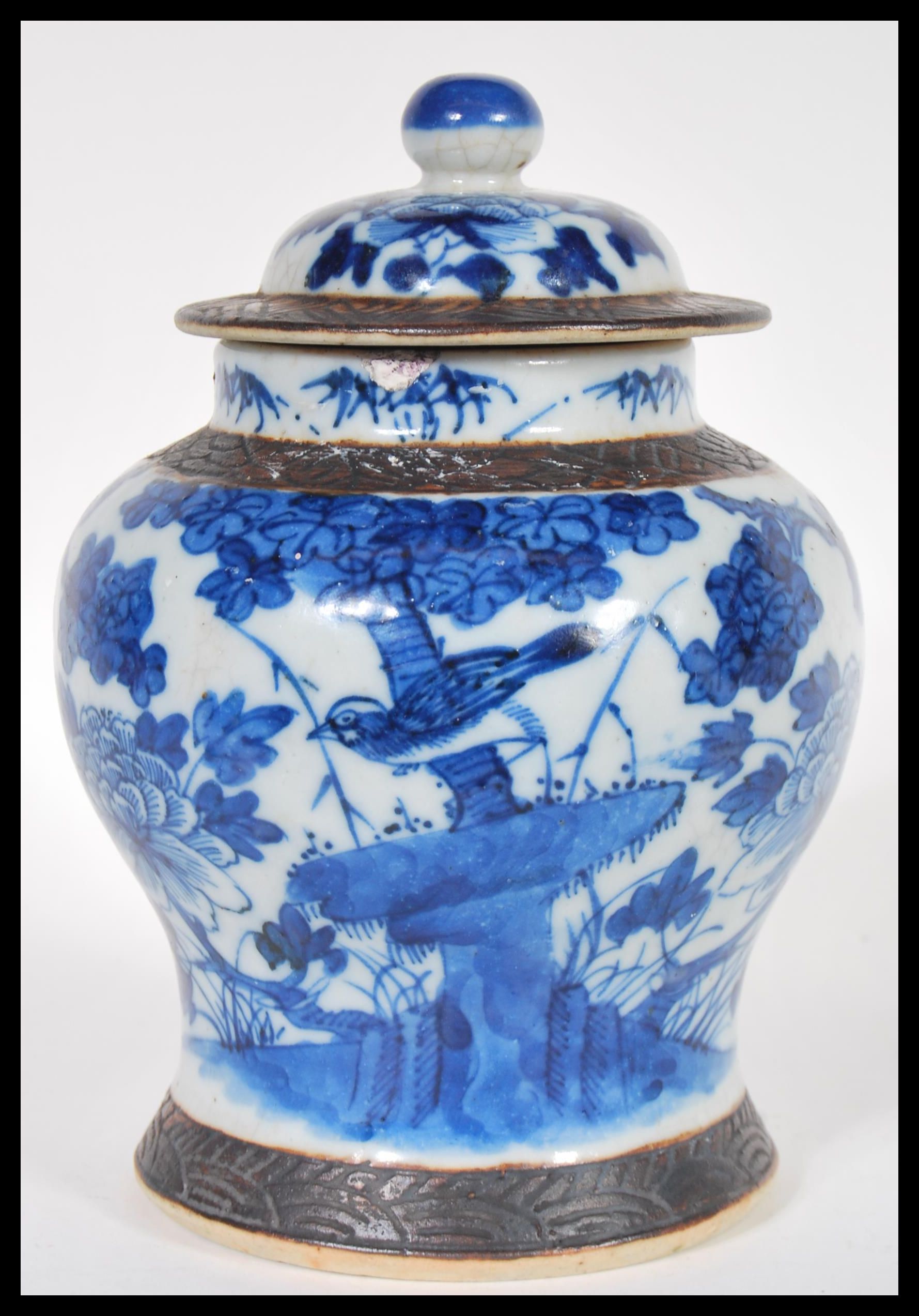 A 19th Century Chinese lidded jar or vase and cove