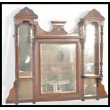 A 19th century Victorian mahogany carved overmante