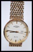 A boxed Rotary Elite 9ct gold gents watch set to a