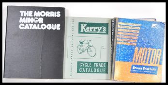 A selection of vintage car and bike related manual