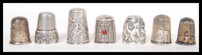 A group of seven hallmarked silver and sterling si