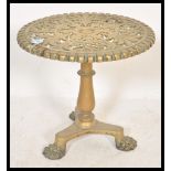 A 19th Century Victorian brass trivet stand table