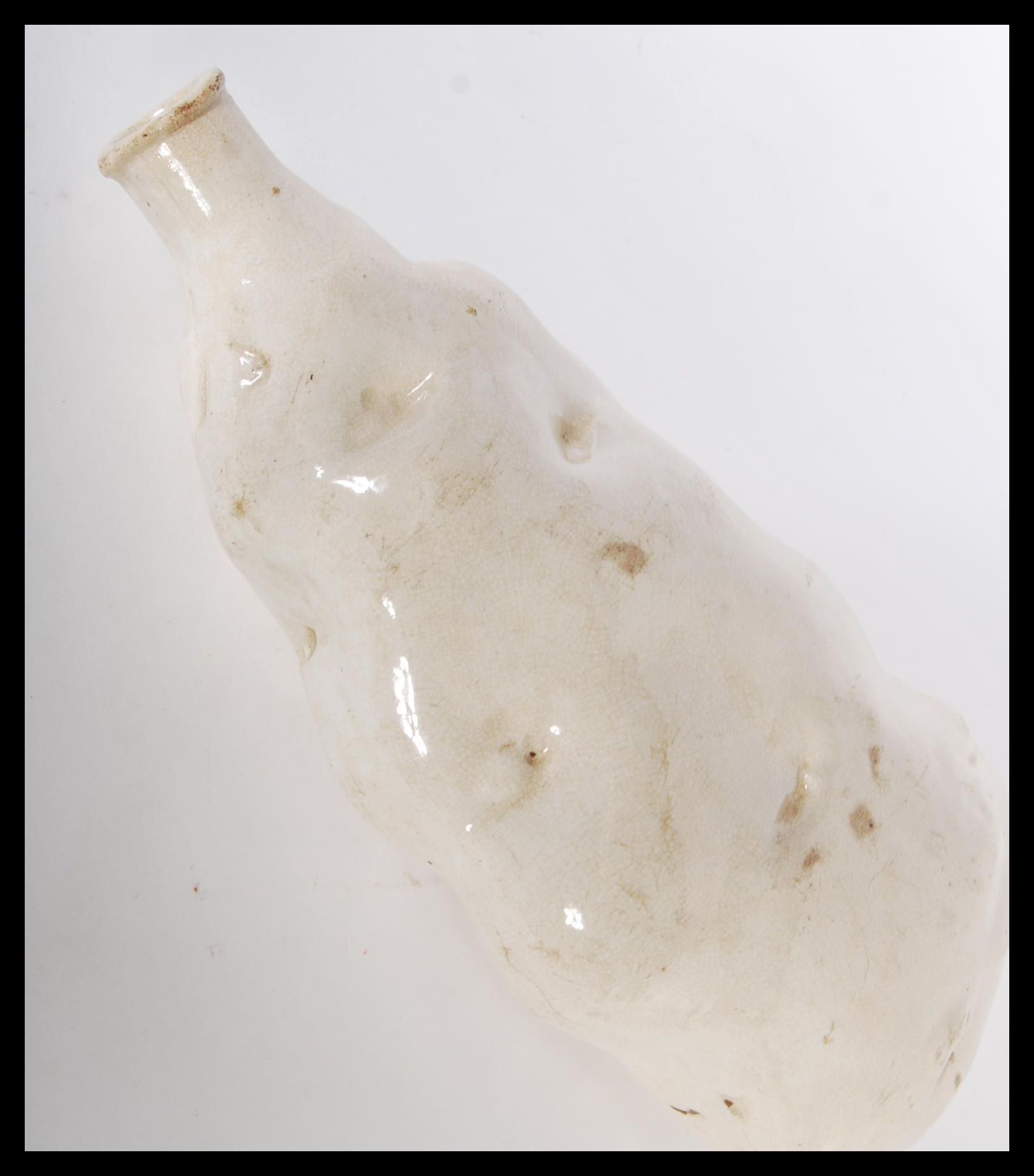 A 19th century ceramic flask in the form of a pota - Image 3 of 4