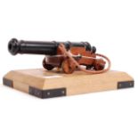 CONTEMPORARY CAST METAL AND WOODEN DESKTOP CANNON