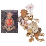 ASSORTED WWI & WWII MILITARY UNIFORM BADGES