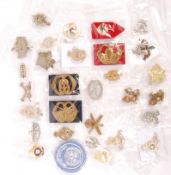 ASSORTED 20TH CENTURY MILITARY UNIFORM CAP BADGES