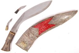BELIEVED NEPALESE 20TH CENTURY KUKRI KNIFE AND SCABBARD