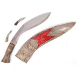 BELIEVED NEPALESE 20TH CENTURY KUKRI KNIFE AND SCABBARD