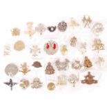 LARGE COLLECTION OF ASSORTED MILITARY CAP BADGES