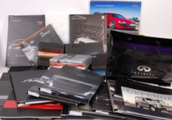 LARGE COLLECTION ASSORTED CAR PRESS RELEASE PACKS